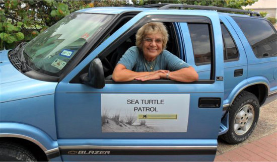 Mary Ann Tous in her Sea Turtle Patrol vehicle on South Padre Island Texas