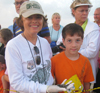 Madeleine Sandefur and her grandson Dan at a sea turtle hatchling release at South Padre Island